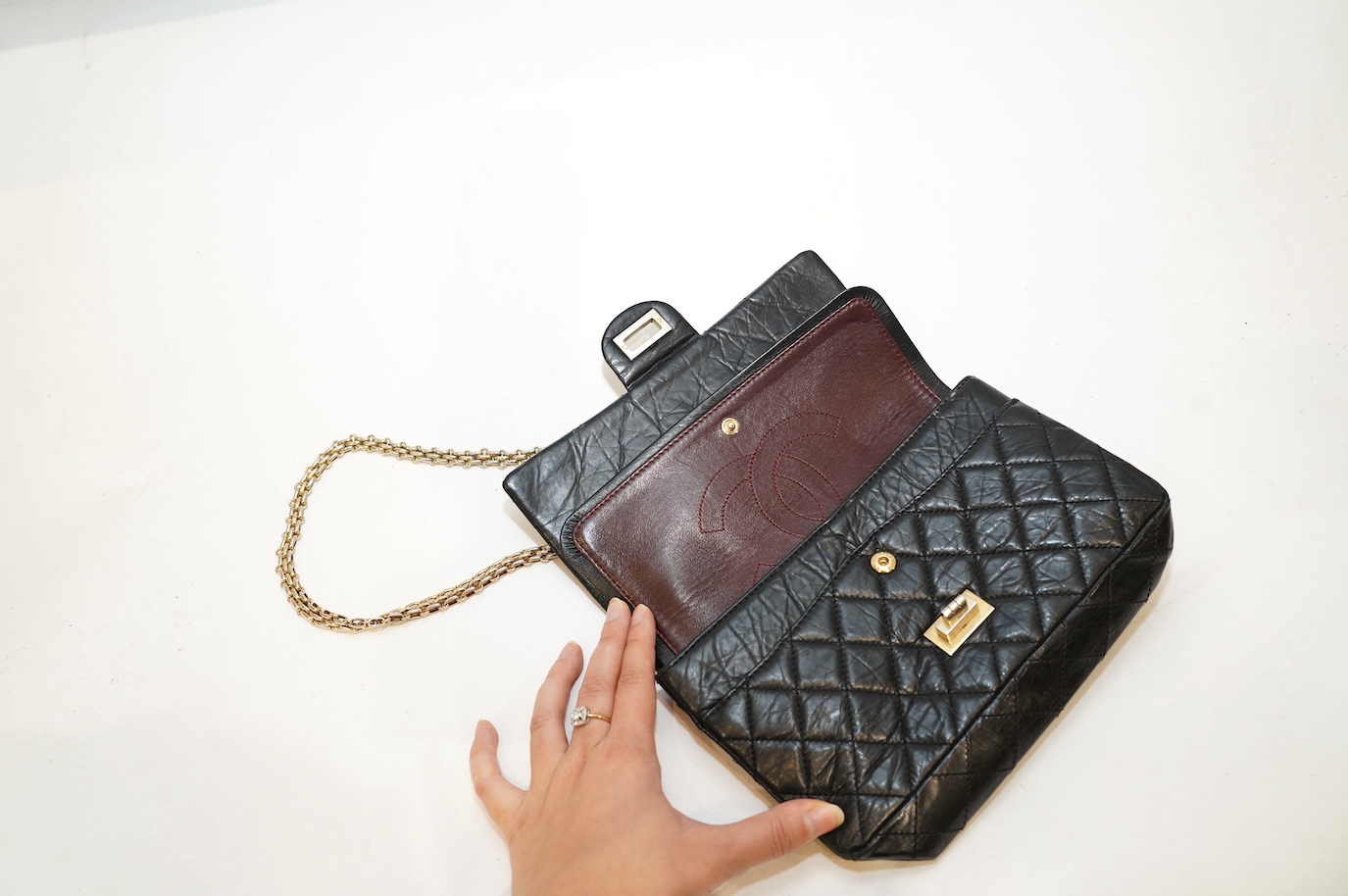 A Chanel 2.55 black leather handbag